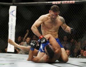 Weidman não tomou conhecido de Vitor Belfort no UFC 187, em Las Vegas (Foto: AP Photo/John Locher)